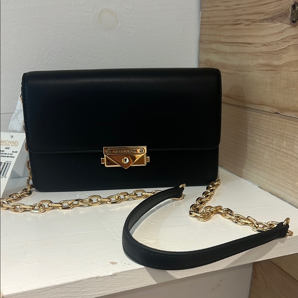 Michael Kors Black Crossbody Bag with Gold Accents
